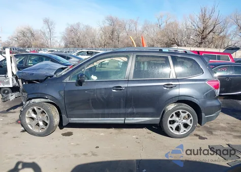 2018 Subaru Forester 2.5I Touring z USA, uszkodzony, nr VIN JF2SJAWC4JH452132